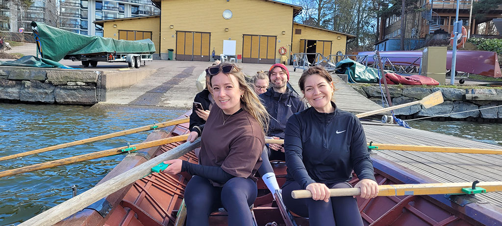 mambers in a traditional Finnish rowing boat